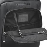 Porsche Design Roadster Backpack XS in black with multiple compartments and adjustable straps, designed for stylish everyday use.