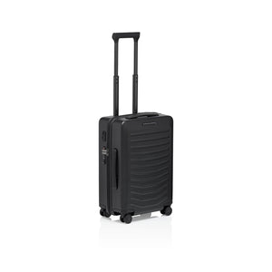 Matte black Porsche Design Roadster 21-inch spinner carry-on luggage with four wheels and sleek modern design.