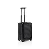 Matte black Porsche Design Roadster 21-inch expandable spinner carry-on luggage with four wheels and sleek modern design.