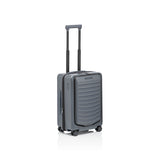 Matte black Porsche Design ROADSTER 21-inch expandable spinner carry-on luggage with four wheels and sleek modern design.