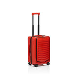 Matte black Porsche Design Roadster 21-inch expandable carry-on luggage with spinner wheels and sleek, modern design.