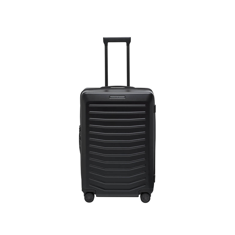 Matte black Porsche Design Roadster 27-inch expandable spinner luggage with four wheels and sleek modern design.