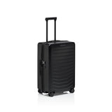 Matte black Porsche Design Roadster 27-inch expandable spinner luggage with four wheels and built-in handle.