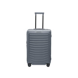 Matte black Porsche Design Roadster 27-inch expandable spinner luggage with four wheels and ergonomic handle for easy travel.