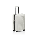 Matte black Porsche Design ROADSTER 27-inch expandable spinner luggage with four wheels and telescoping handle.