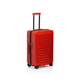 Matte black Porsche Design ROADSTER 27-inch expandable spinner luggage with durable wheels and sleek modern design.