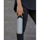 Purist Mover 18oz water bottle in clear with black lid, made of durable material, designed for easy hydration on the go