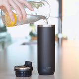 Black Purist Mover 18oz water bottle with a sleek design, featuring the Purist brand logo and a secure screw-on lid.