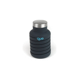 Que Bottle accessory, clear plastic clip for securing bottles, with Que branding, designed for easy attachment and portability.