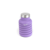 Que Bottle accessory, durable and sleek design, with the Que brand logo visible on the transparent plastic container.