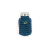Que Bottle accessory by Que, featuring a sleek, modern design with the brand logo visible.