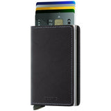 Secrid Slimwallet in black showing front view with cards partially visible, compact leather wallet with sleek design.