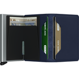 Open Secrid Slimwallet in navy showing card compartments and sleek design, compact leather wallet for everyday use.