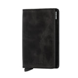 Secrid Slimwallet in vintage black leather, front view showing compact design and card slots for secure storage.