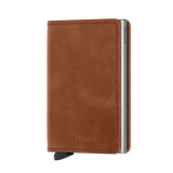 Secrid Slimwallet in vintage cognac and silver, featuring a compact design with card slots and a sleek leather finish.