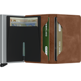 Open Secrid Slimwallet in vintage cognac and silver, showing card slots and compact design for secure, stylish storage.