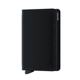 Secrid Slimwallet in black with card slots and metal frame, shown from the front. Compact leather wallet for cards and cash.