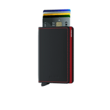 Secrid Slimwallet in matte black and red, featuring a compact design with card slots visible from the front.