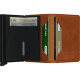 Open Secrid Slimwallet in SPF Cognac leather showing card slots and interior compartments. Compact and stylish wallet design.