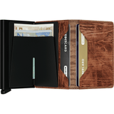 Open Secrid Slimwallet showing card slots and interior design, crafted from Dutch Martin whiskey leather, compact and stylish.