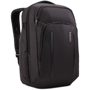 Thule Crossover 2 backpack 30L in black with multiple compartments and padded straps, designed for outdoor and daily use.