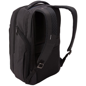Thule Crossover 2 30L backpack with multiple compartments, black fabric, padded shoulder straps, and front organization panel.