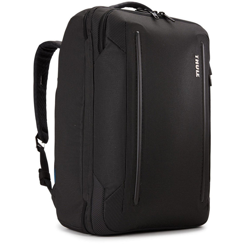 Thule Crossover 2 convertible carry-on luggage with multiple compartments and durable design, shown in a sleek black finish.