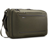 Thule Crossover 2 convertible carry-on luggage with durable fabric and multiple compartments, ready for travel.