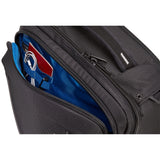 Thule Crossover 2 convertible carry-on luggage with multiple compartments and adjustable straps, designed for travel convenience.