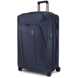 Black Thule Crossover 2 Carry-On Spinner luggage with four wheels and telescopic handle for easy travel.