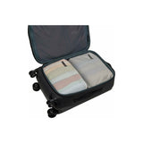 Medium Thule compression packing cube for travel organization, with multiple compartments and durable fabric.