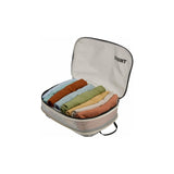 Thule medium compression packing cube for organization, showing its compact, zippered design and durable material for travel.