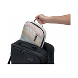 Medium Thule compression packing cube for travel organization, showing its compact, lightweight design with multiple compartments.