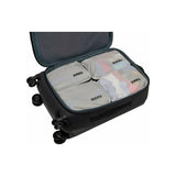 Small Thule compression packing cube for travel organization, showing a compact, durable packing organizer with zipper closure.