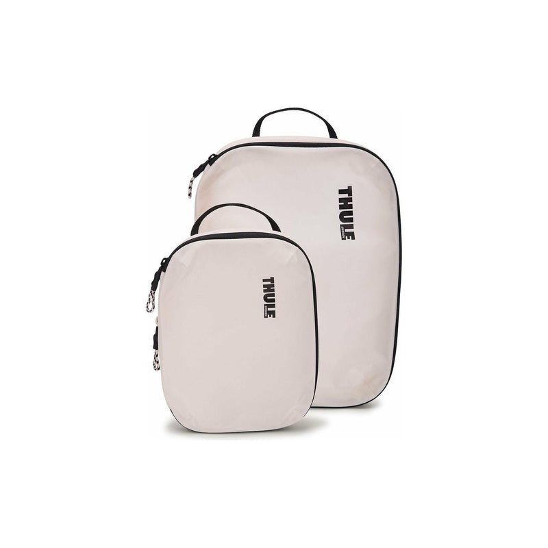 Thule Compression Cube Set of packing organizers in white for efficient travel organization and space-saving packing.