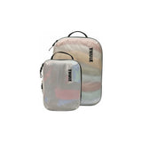 Thule Compression Cube Set packing organizers in white, designed for efficient packing and clothes organization during travel.