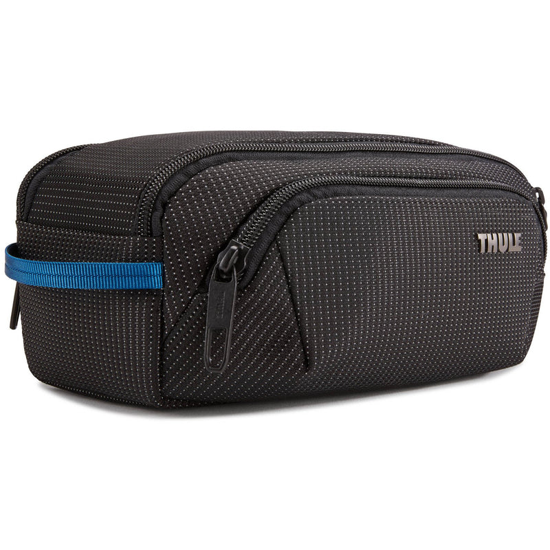 Thule Crossover 2 toiletry bag with multiple compartments and durable fabric for travel organization.