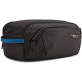 Thule Crossover 2 toiletry bag with multiple compartments and durable fabric for travel organization.