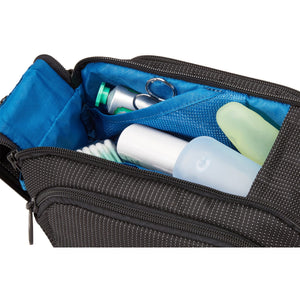 Thule Crossover 2 toiletry kit with zippered compartments and durable fabric, designed for travel organization.