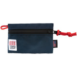 Topo Designs accessory bag in durable fabric with zipper closure, designed for organizing small essentials.