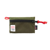Topo Designs accessory bag in vibrant color with zipper closure and compact design for organizing small items.