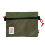 Topo Designs accessory bag with multiple compartments, durable fabric, and zipper closure, designed for organization and portability.