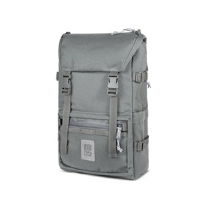 Charcoal Topo Designs Rover Pack Tech backpack with multiple compartments and padded straps, designed for outdoor and daily use.