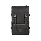 Black Topo Designs Rover Pack Tech backpack with multiple compartments and padded straps for comfortable carrying.