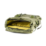 Topo Designs Rover Pack Tech backpack with durable fabric, multiple compartments, and ergonomic straps, designed for outdoor use.