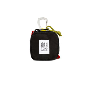 Black Topo Designs square packing organization bag with zipper closure and compact design for travel and storage.