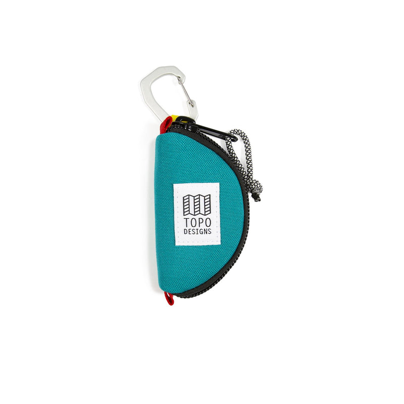 Turquoise Topo Designs Taco Bag packing organizer with multiple compartments for travel and gear organization.