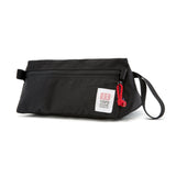 Topo Designs toiletry kit with zipper closure and compact design, ideal for travel and organization of personal grooming essentials.