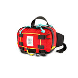Topo Designs Subalpine Hip Pack waist bag with adjustable strap and multiple compartments, designed for outdoor activity and storage.