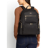 Tumi Voyageur Carson backpack with multiple compartments, padded shoulder straps, and sleek design for travel and daily use.